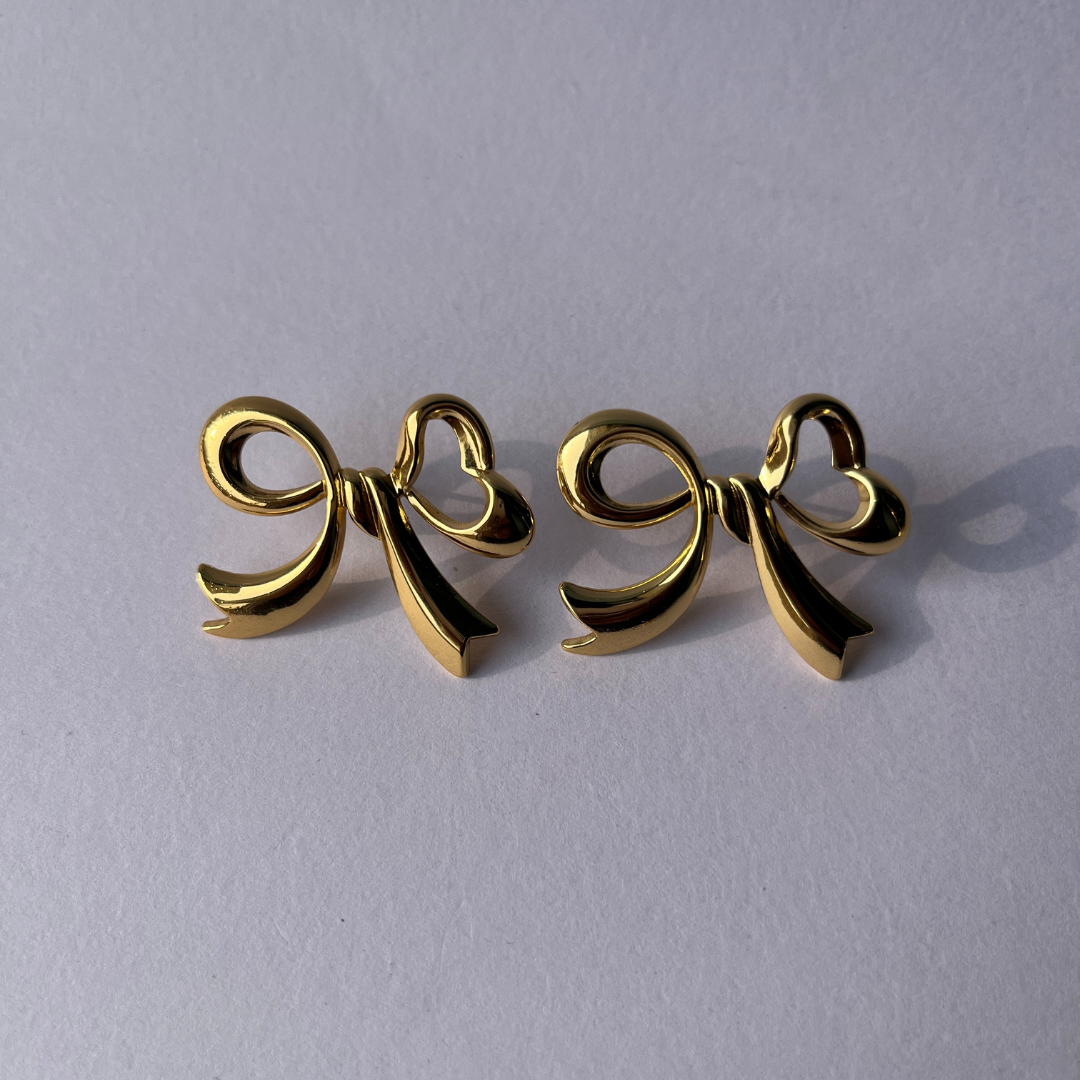 Golden Bow Statement Studs
