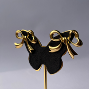 Golden Bow Statement Studs